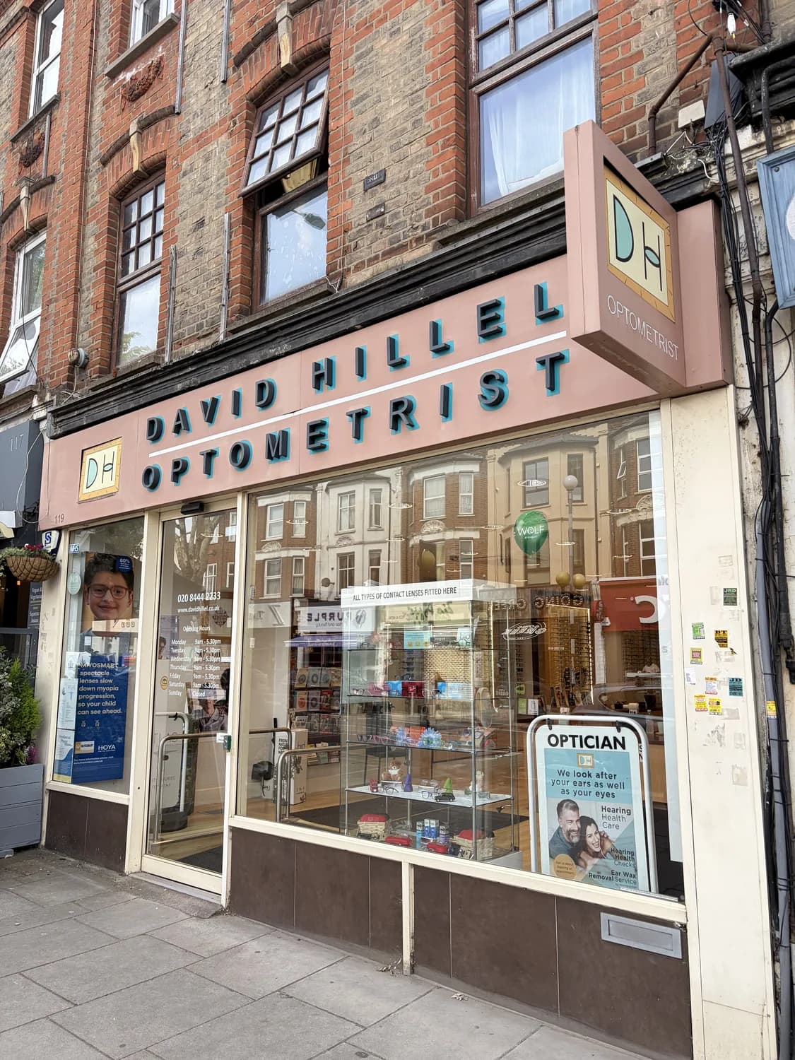 David Hillel Optometrist storefront on Finchley High Road, the shared premises of the Atlas Osteopathy Finchley clinic.