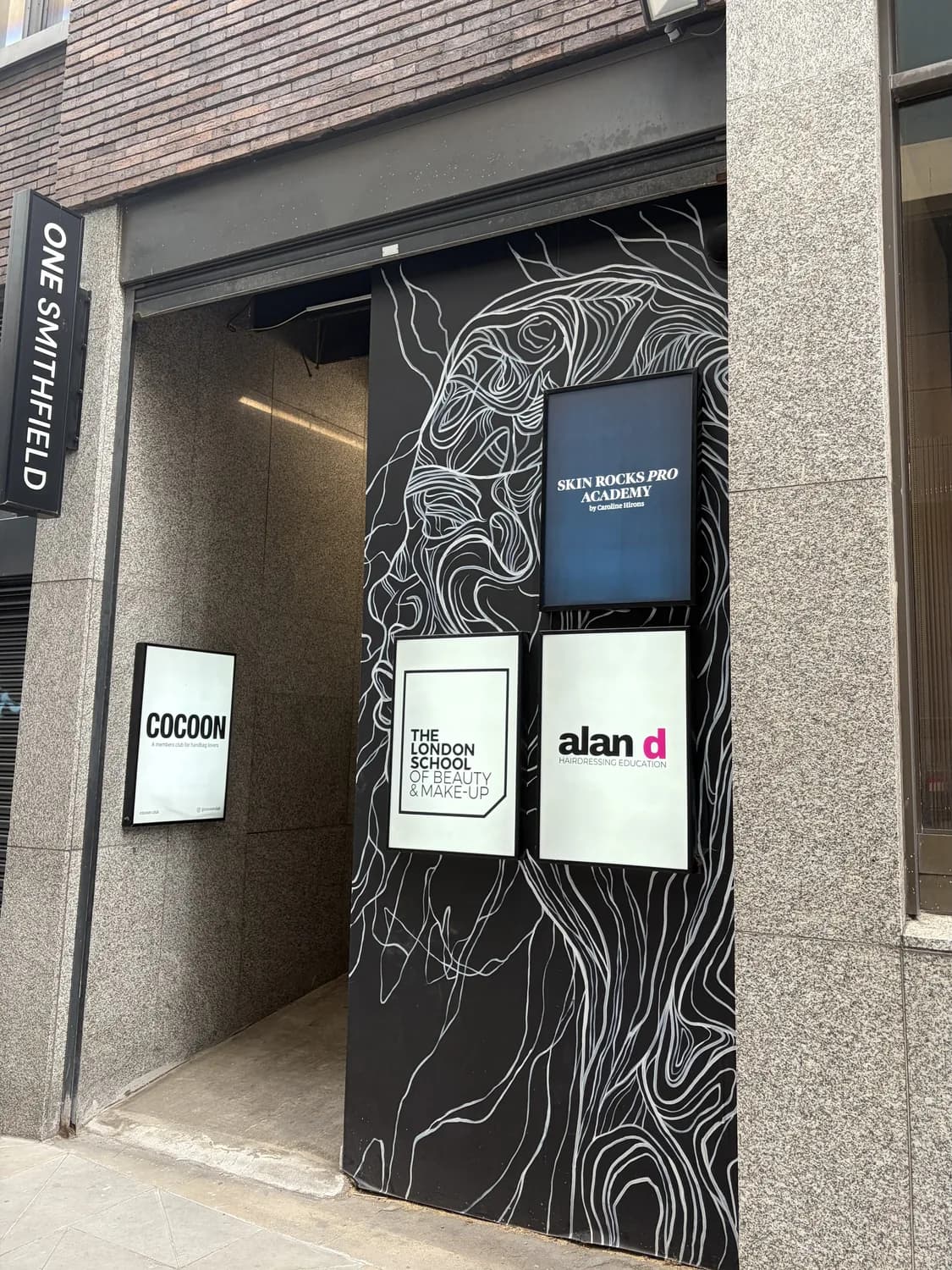 Entrance to the One Smithfield building where the Atlas Osteopathy Moorgate clinic is based.